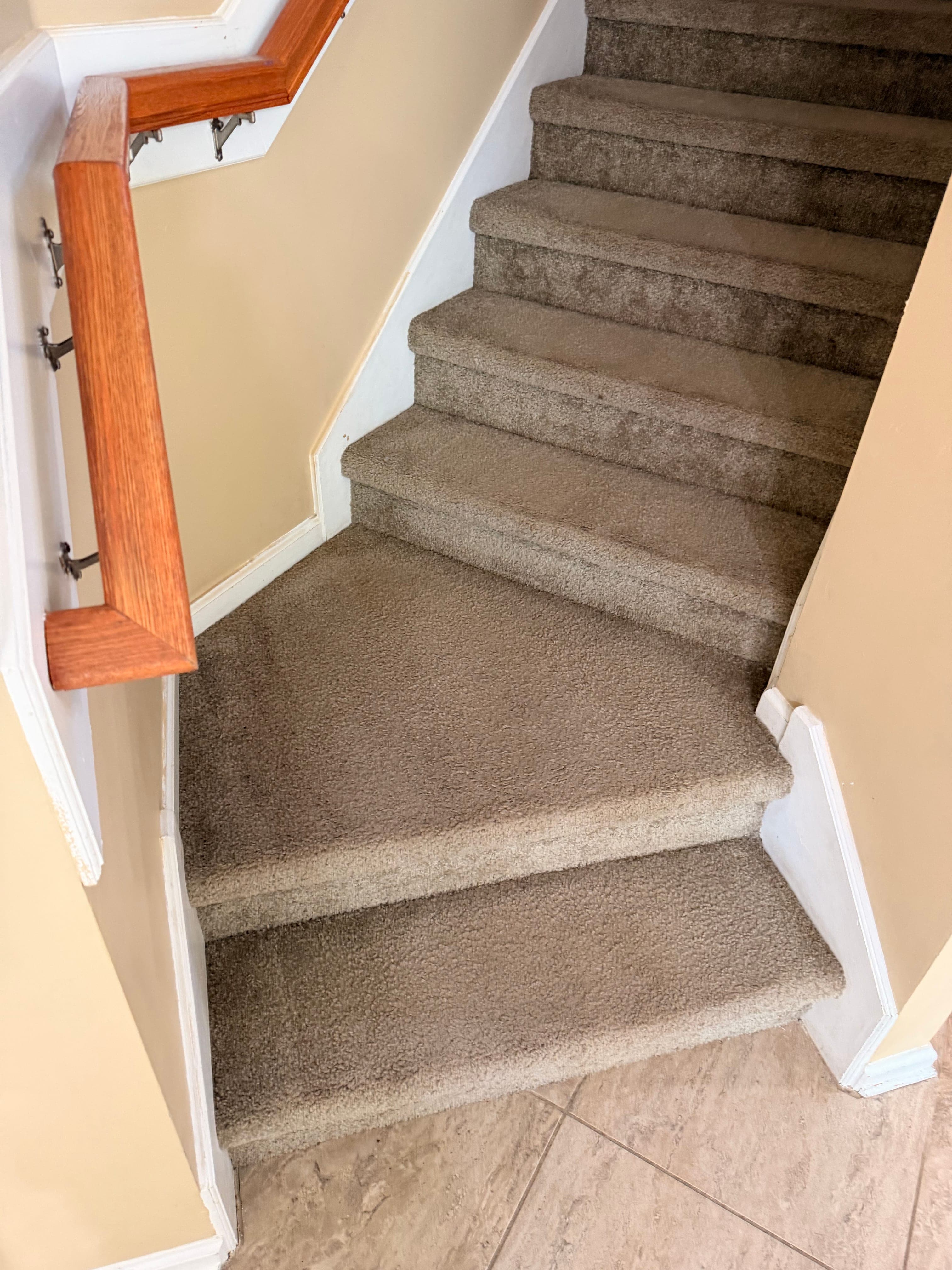 Carpeted stairs before professional cleaning in Jacksonville, FL