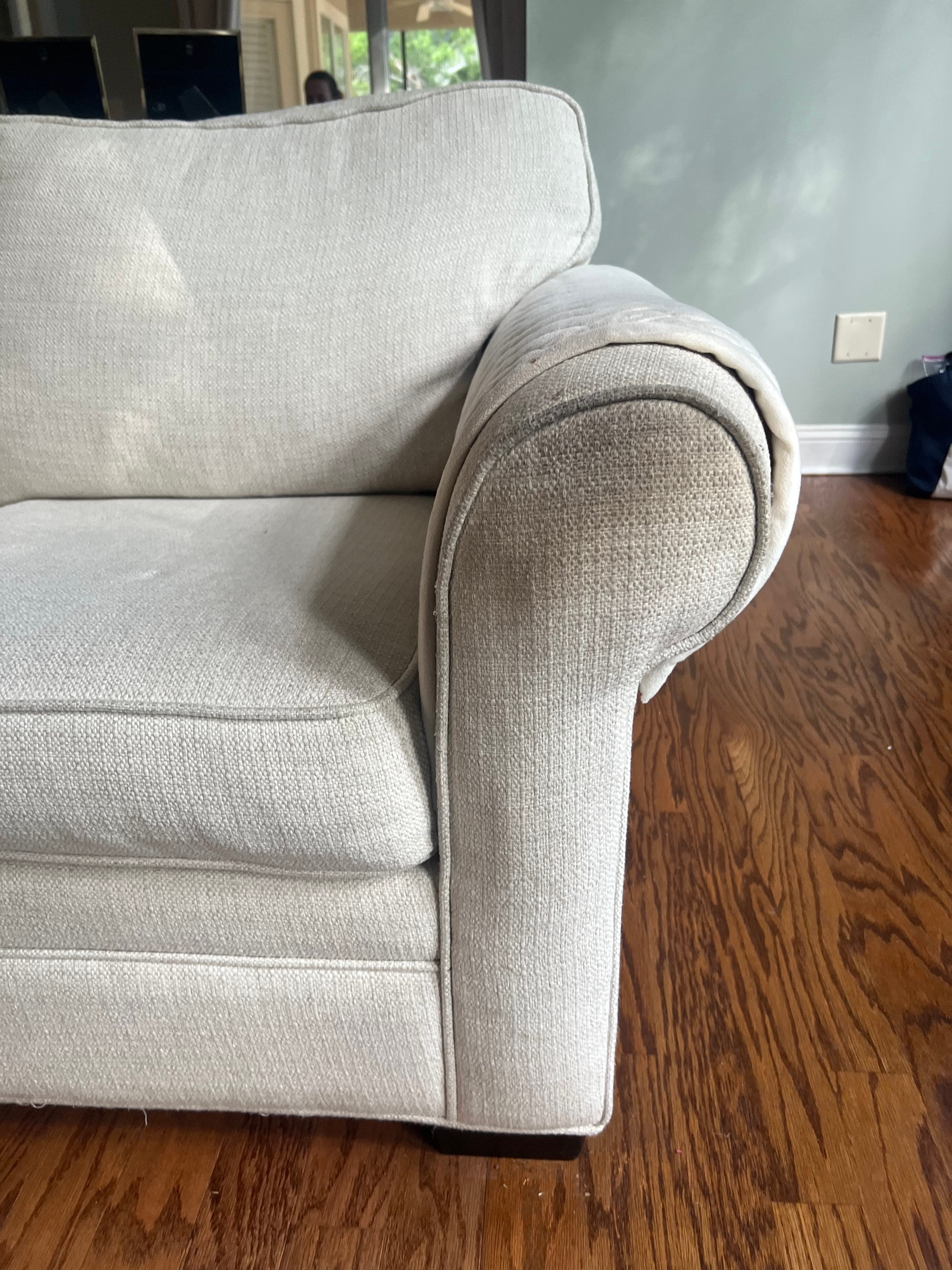 Couch before professional upholstery cleaning in Jacksonville, FL