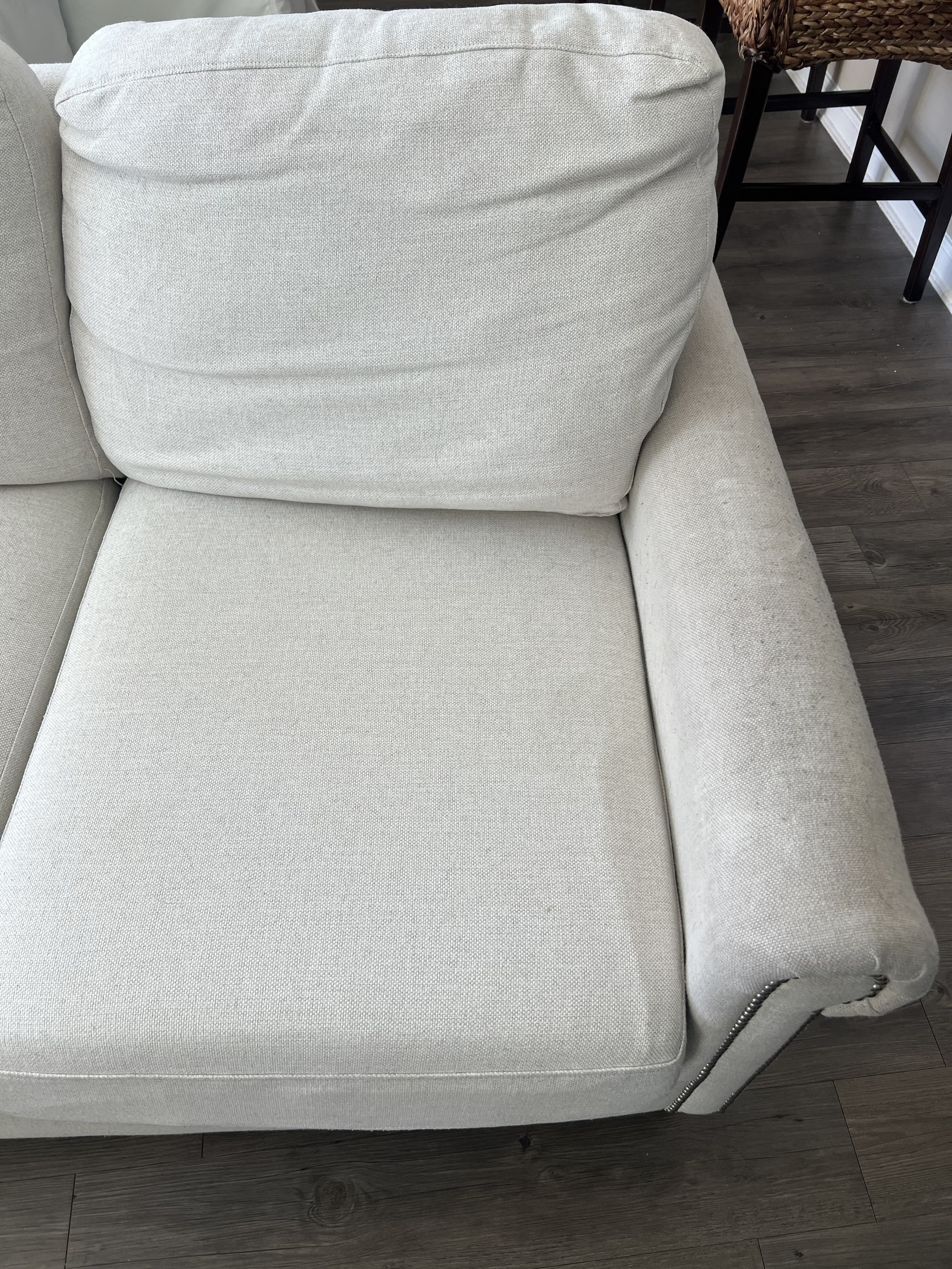 Fabric sofa before professional upholstery cleaning in Jacksonville, FL