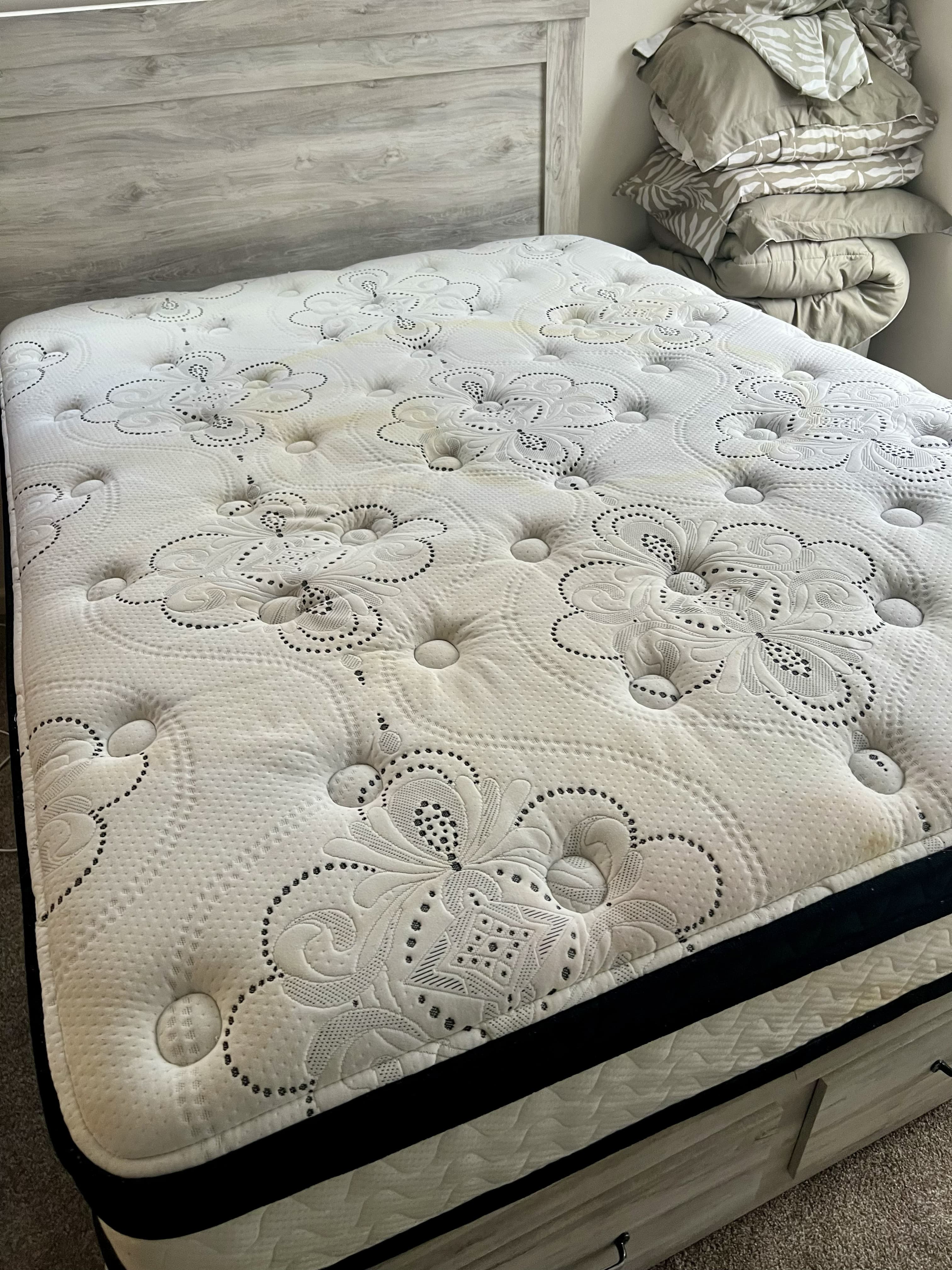 Mattress before professional upholstery cleaning in Jacksonville, FL