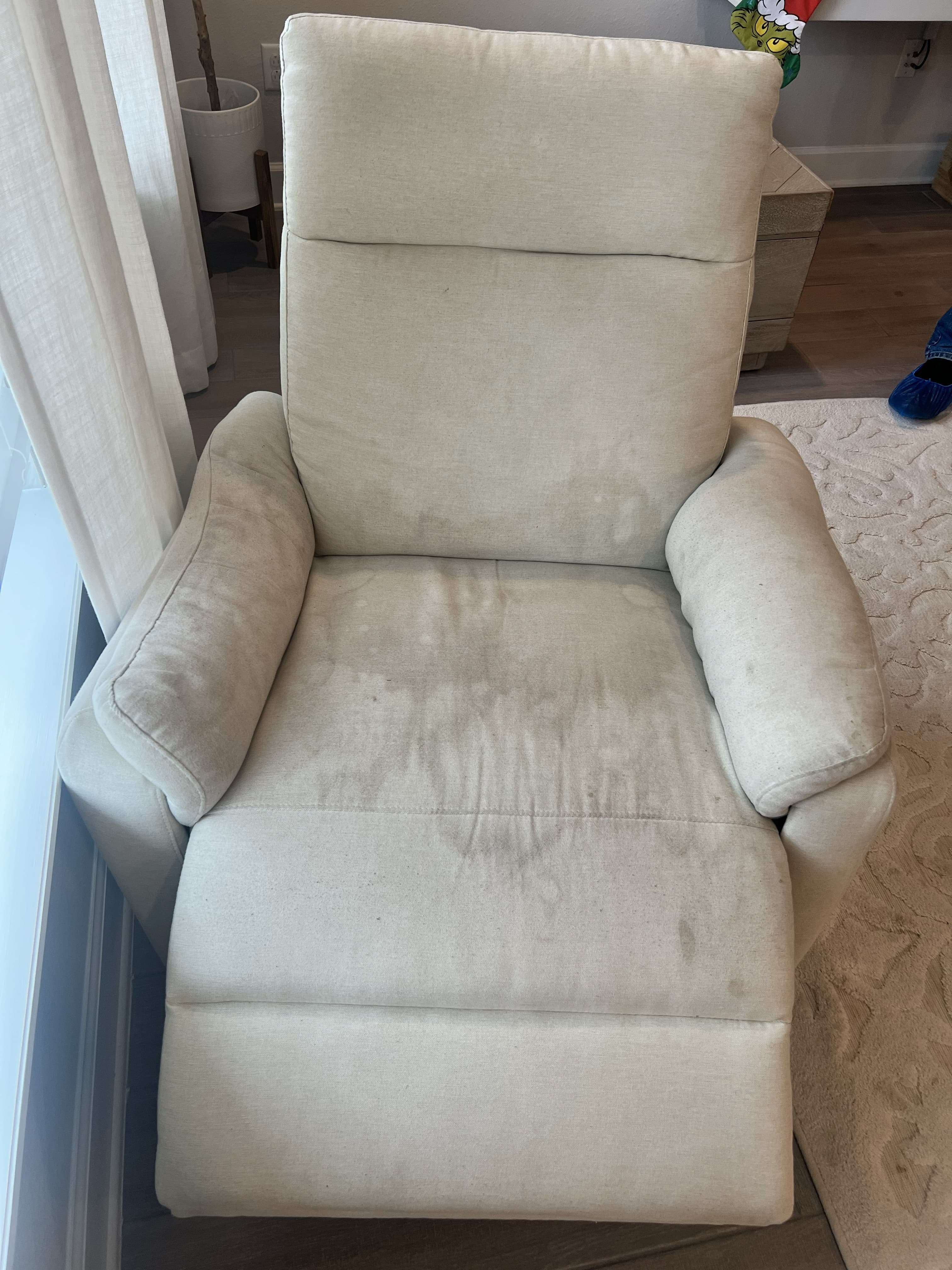 Recliner chair before professional upholstery cleaning in Jacksonville, FL